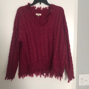 Frayed sweater